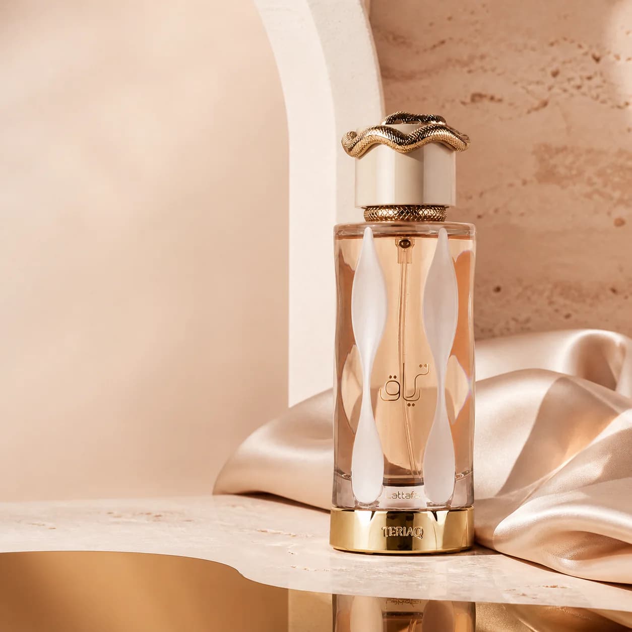 Teriaq bottle resting on cream satin