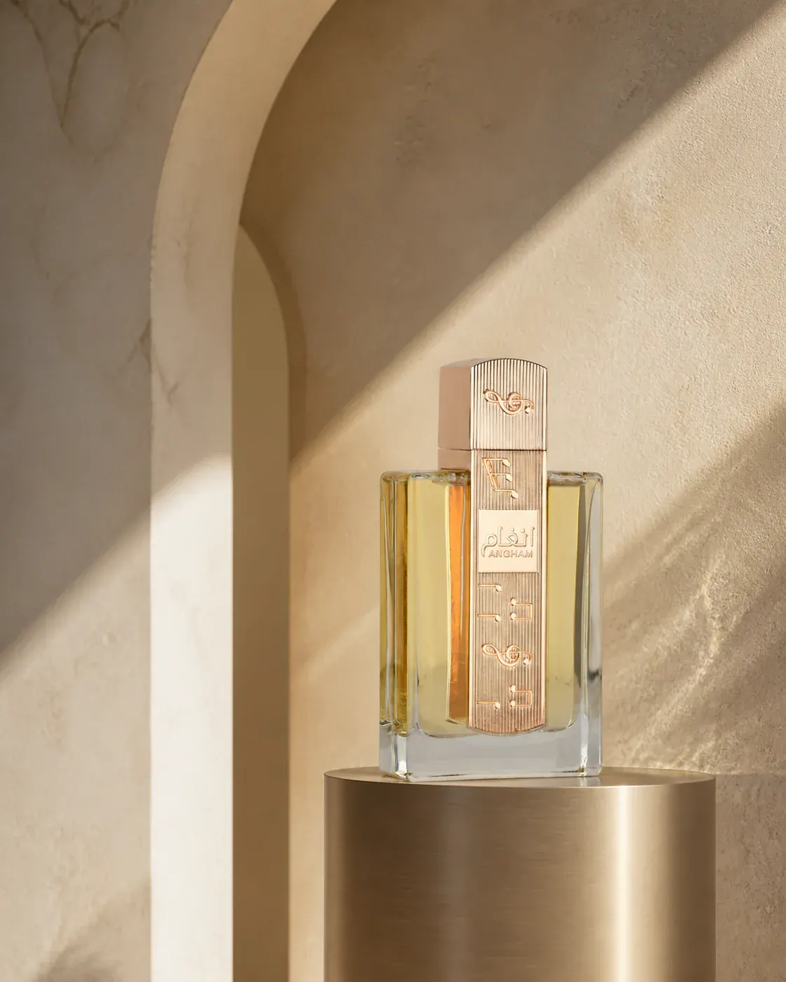 Angham bottle in a sunlit travertine arch